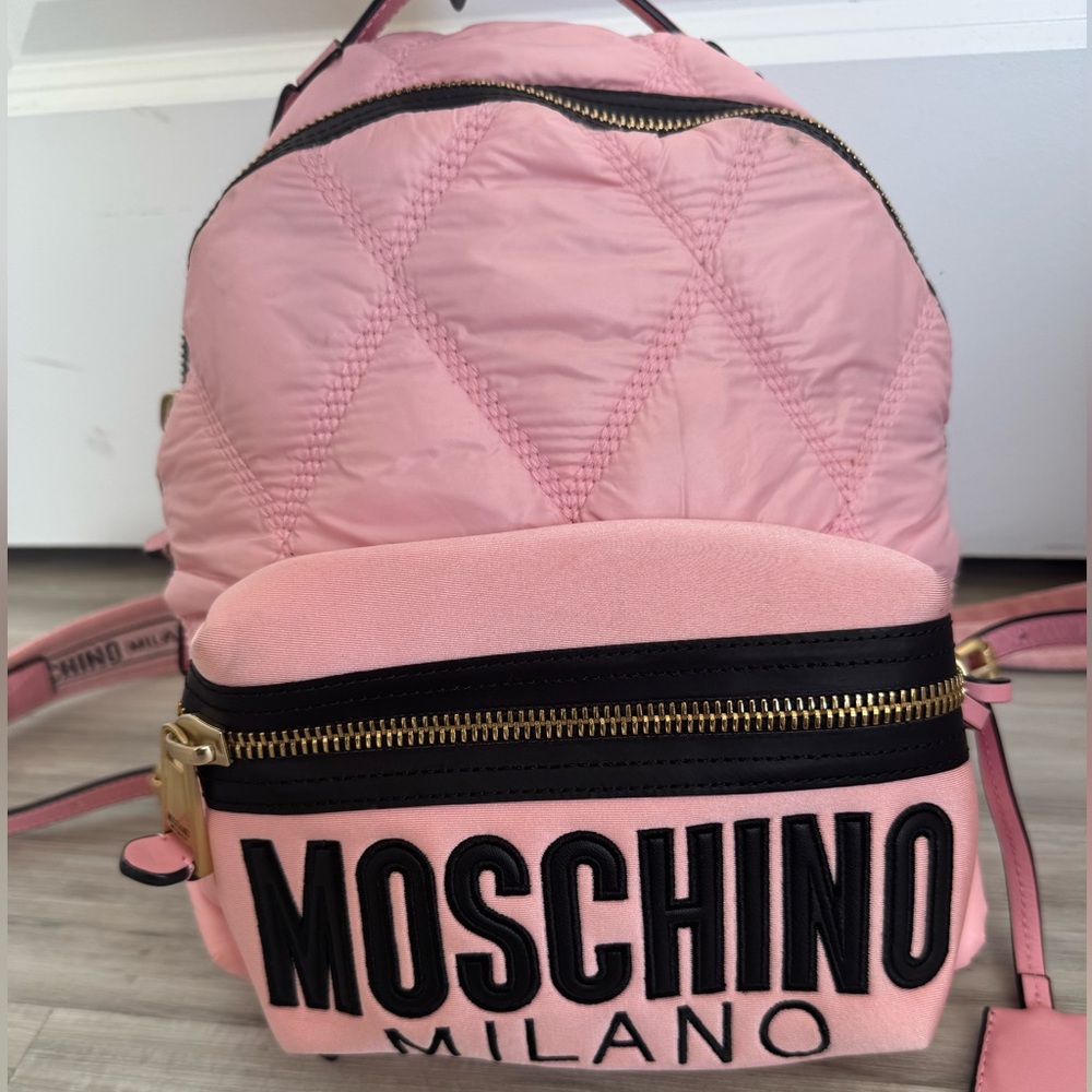 Moschino Pink Logo Embossed Quilted Backpack with Black Accents